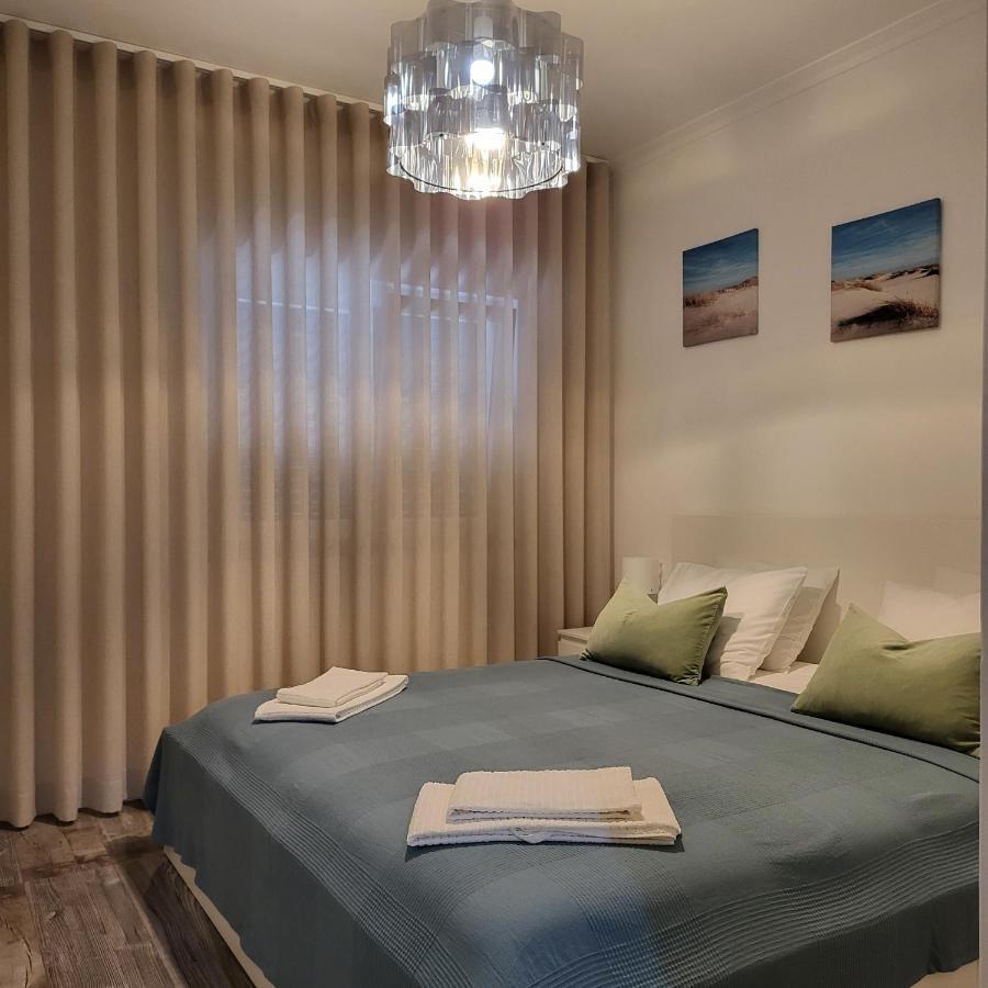 Nandos Apartement Costa de Caparica Buitenkant foto