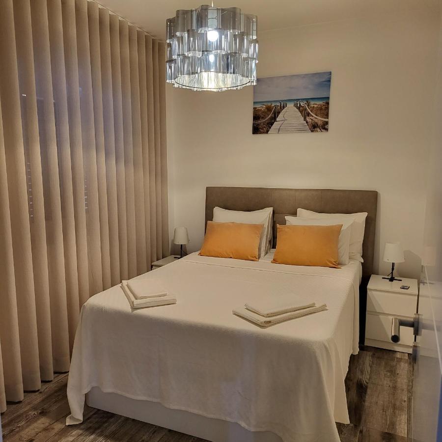 Nandos Apartement Costa de Caparica Buitenkant foto